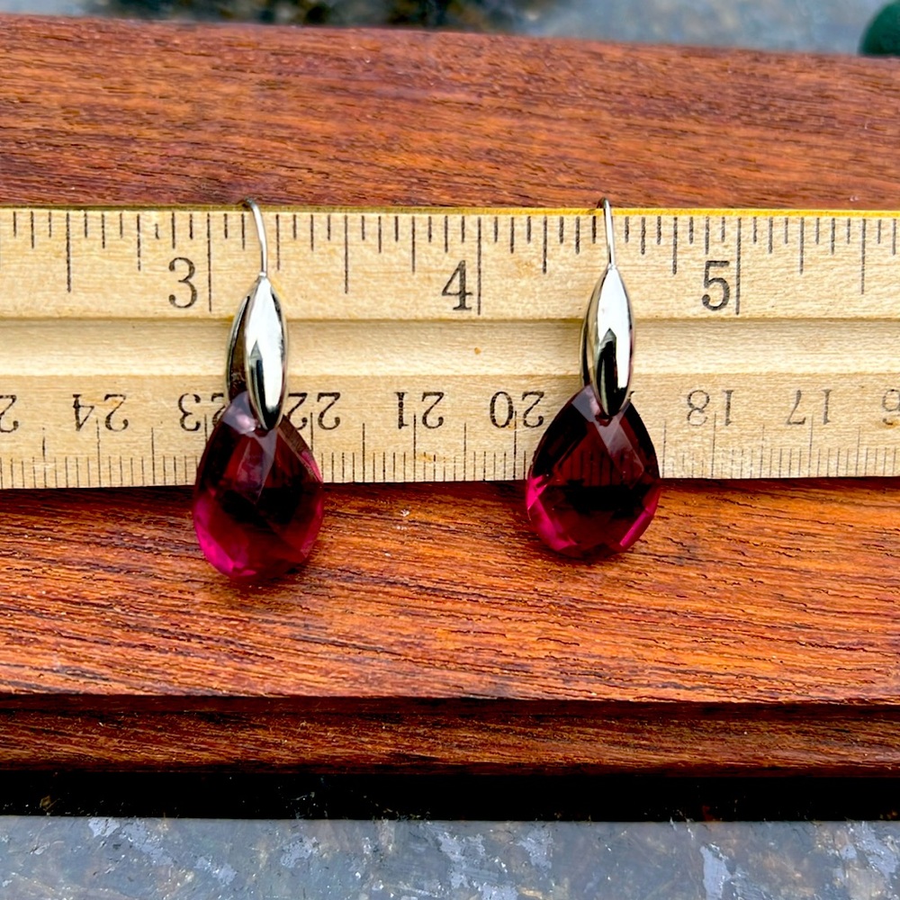 Faceted drop earrings set in stainless steel